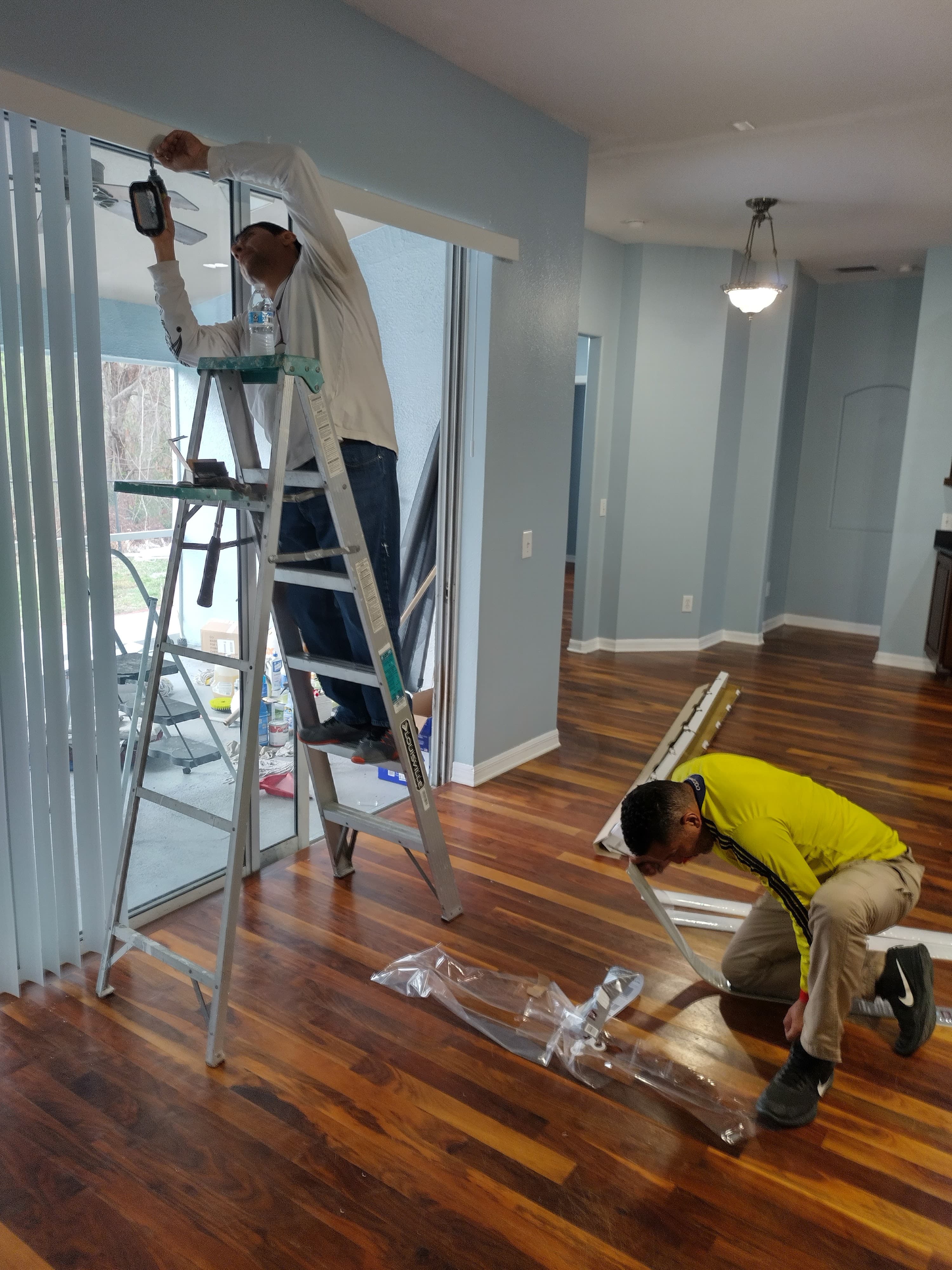 Construction workers collaborating on a building site for SPM Maintenance Solutions LLC